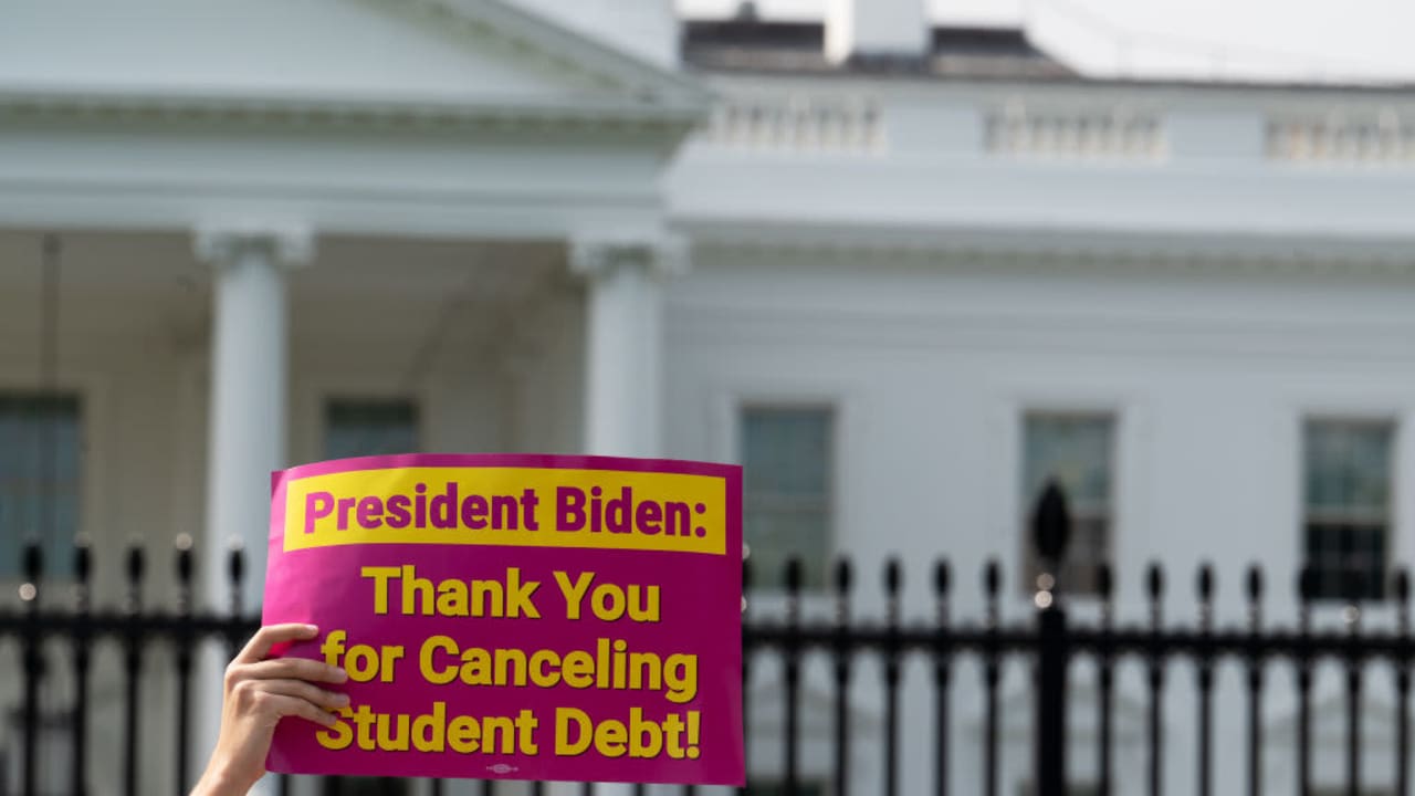 WASHINGTON, DC - AUGUST 25: George Washington University student Kai Nilsen and other student loan debt activists rally outside the White House a day after President Biden announced a plan that would cancel $10,000 in student loan debt for those making less than $125,000 a year in Washington, DC, on August 25, 2022. (Photo by Craig Hudson for The Washington Post via Getty Images)