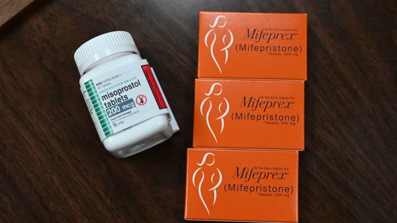 Mifepristone (Mifeprex) and Misoprostol, the two drugs used in a medication abortion, are seen at the Women's Reproductive Clinic, which provides legal medication abortion services, in Santa Teresa, New Mexico, on June 17, 2022. Mifepristone is taken first to stop the pregnancy, followed by Misoprostol to induce bleeding. - In the wake of Friday's ruling by the US Supreme Court striking down Roe v Wade and the federally protected right to an abortion, women from Texas and other states are traveling to clinics like the Women's Reproductive Health Clinic in New Mexico for legal abortion services under the state's more liberal laws.