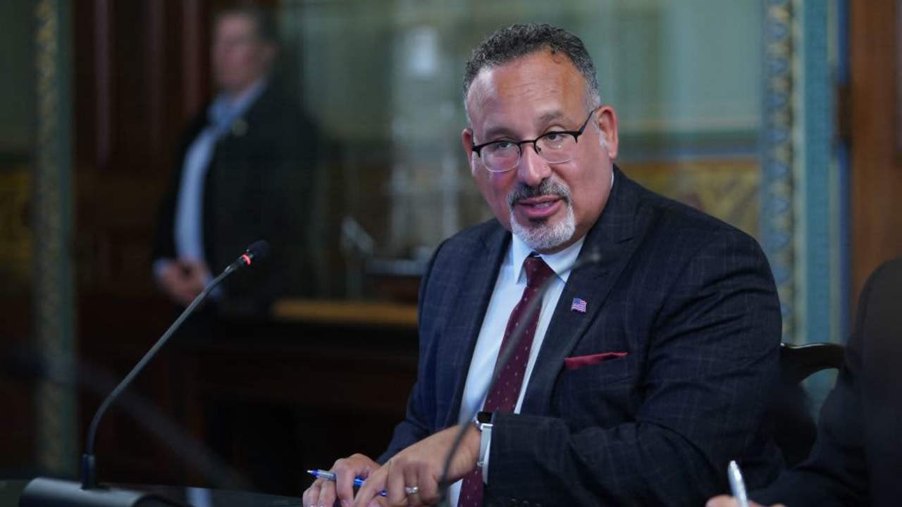 U.S. Education Secretary Miguel Cardona speaks during a roundtable discussion with US Vice President Kamala Harris and college presidents in the Eisenhower Executive Office Building in Washington, DC.