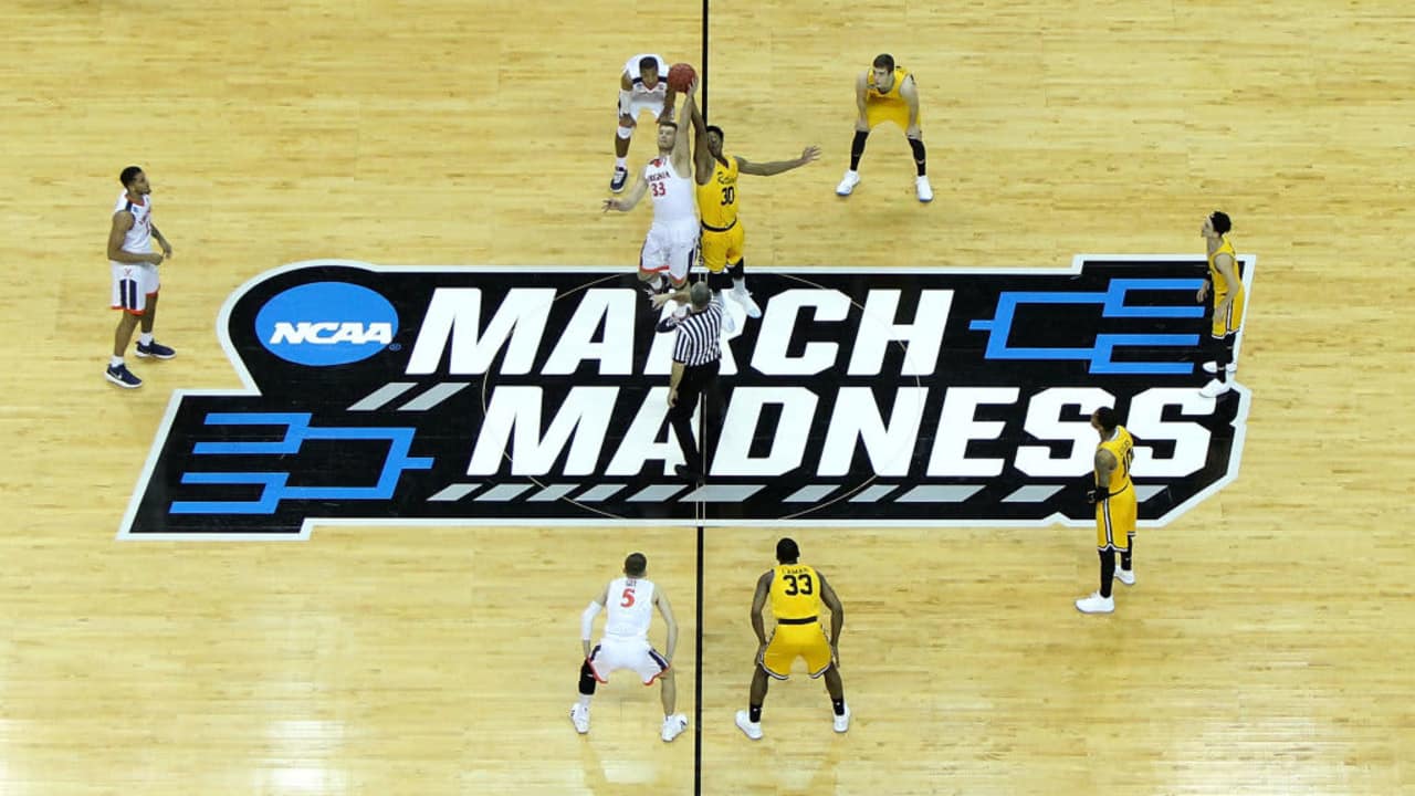 CHARLOTTE, NC - MARCH 16: The Virginia Cavaliers tip off against the UMBC Retrievers in the first round of the 2018 NCAA Men's Basketball Tournament at Spectrum Center on March 16, 2018 in Charlotte, North Carolina. (Photo by Streeter Lecka/Getty Images)