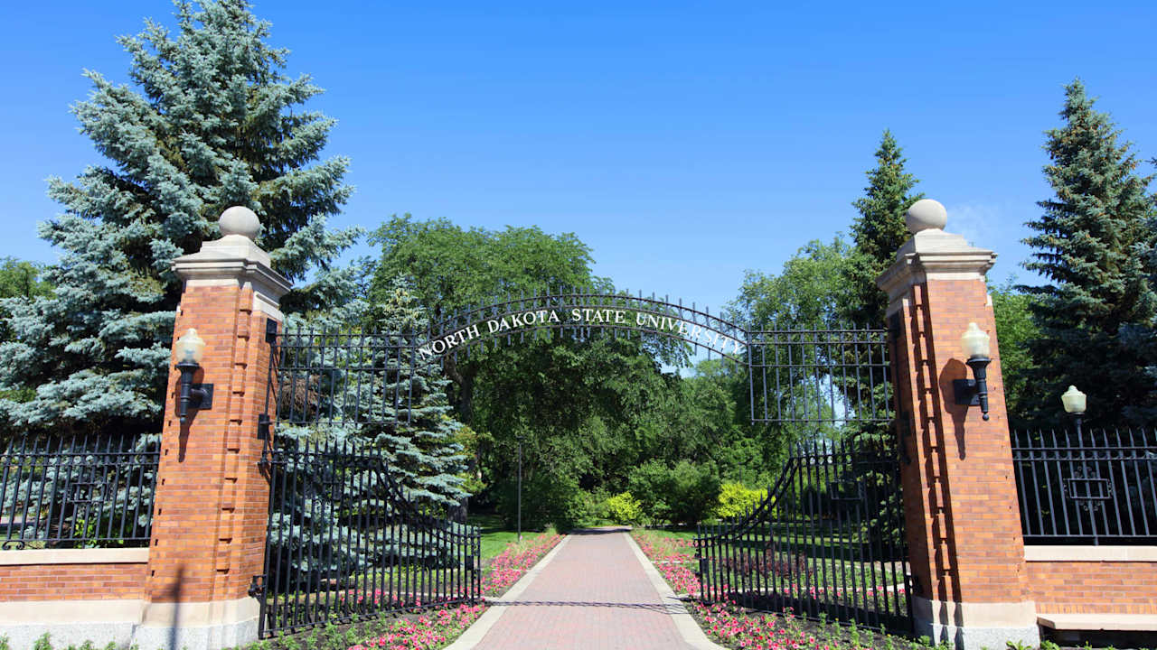 Daytime view of North Dakota State University entrance sign along N University Dr