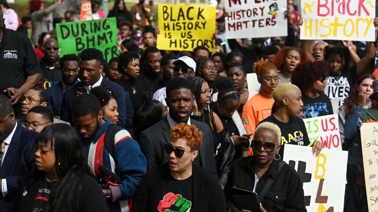 TALLAHASSEE, FL - FEBRUARY 15: Demonstrators protest Florida Governor Ron DeSantis plan to eliminate Advanced Placement courses on African American studies in high schools as they stand outside the Florida State Capitol on February 15, 2023 in Tallahassee, Florida. DeSantis says Advanced Placement courses on African American studies violates the Stop WOKE Act, which curbs race-related and gender curriculum from Florida classrooms. (Photo by Joshua Lott/The Washington Post via Getty Images)
