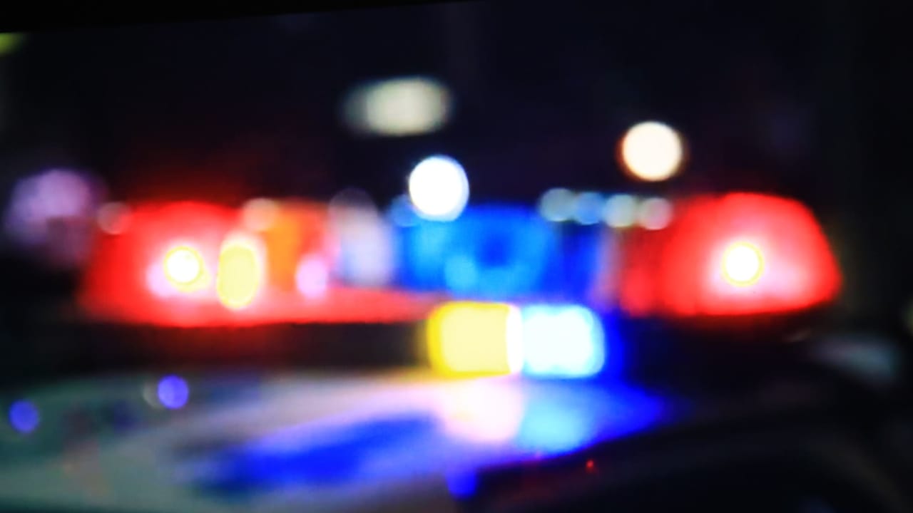 police car headlights in a blurry focus.
