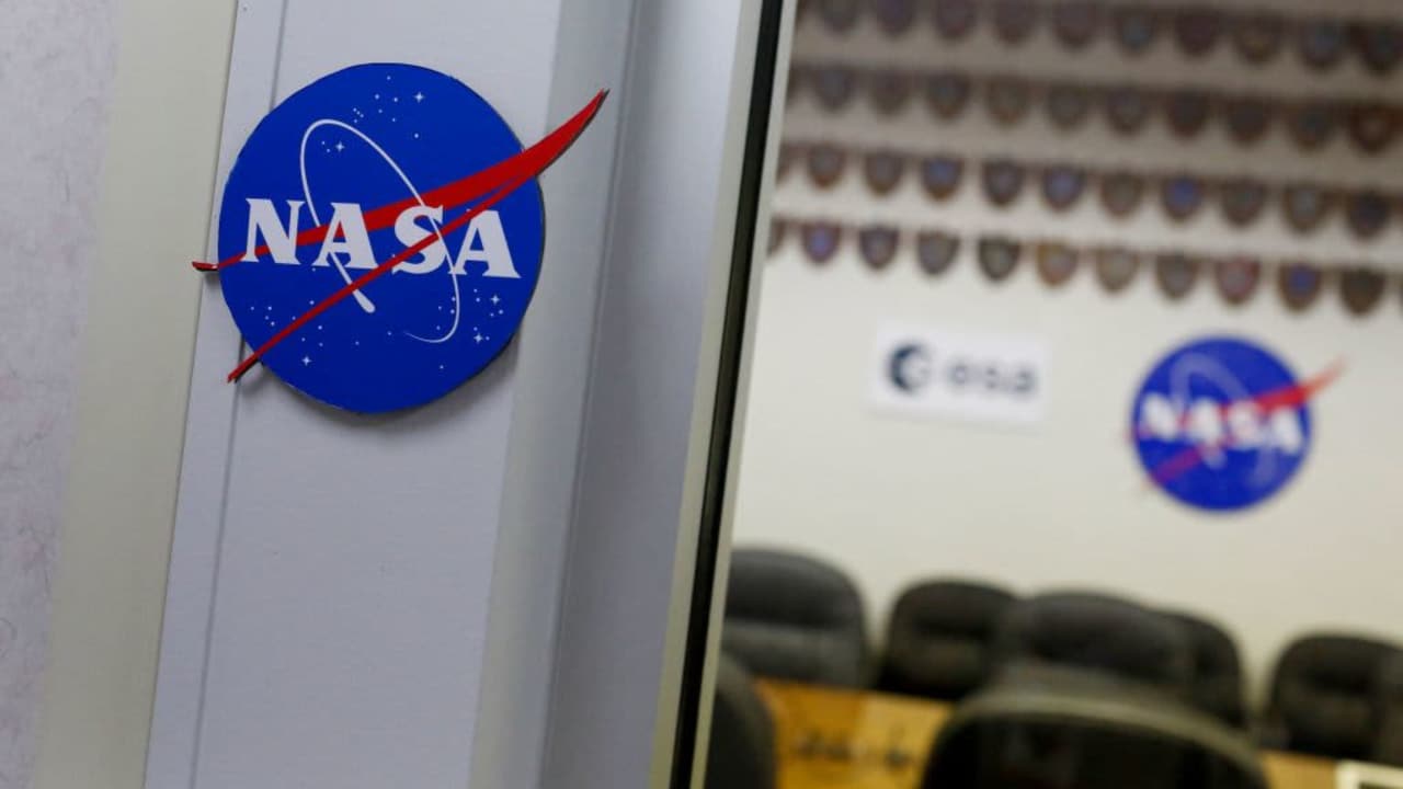NASA logos are seen in the conference room of the Astronaut Crew Quarters (ACQ) at Kennedy Space Center, in Cape Canaveral, Florida, on June 14, 2022. - NASA's Kennedy Space Center in Florida has played a leading role in the American space program for 60 years. The Launch Operations Center was first established in July 1962, and renamed the John F. Kennedy Space Center in December 1963. (Photo by Eva Marie UZCATEGUI / AFP) (Photo by EVA MARIE UZCATEGUI/AFP via Getty Images)