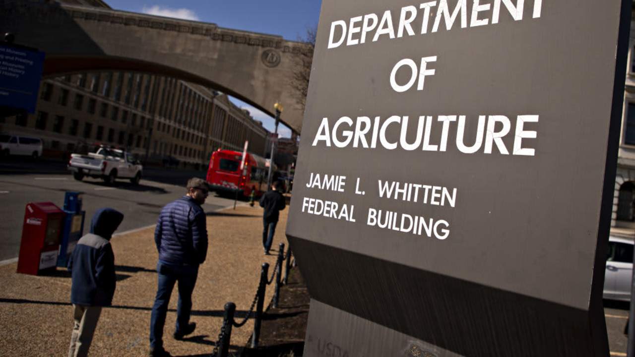 Signage stands outside the U.S. Department of Agriculture (USDA) headquarters in Washington, D.C., U.S, on Friday, Feb. 14, 2020. The USDA boosted its outlook on Chinese imports, including purchases from the U.S. That likely reflects optimism on the partial U.S.-China trade deal signed last month. Photographer: Andrew Harrer/Bloomberg via Getty Images