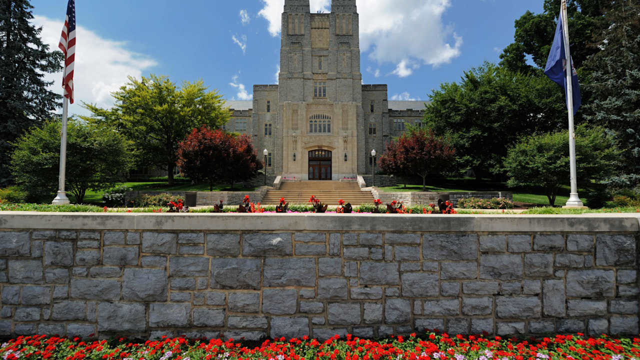 Blacksburg, Virginia, USA - July 19, 2016: Looking over wall toward building on the campus of Virginia Polytechnic Institute and State University in Blacksburg, Virginia.