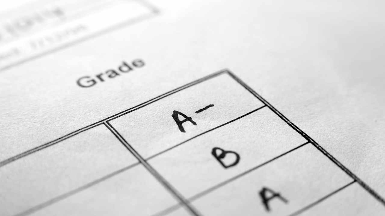 Macro shot of A- on white results sheet. Extremely shallow focus.