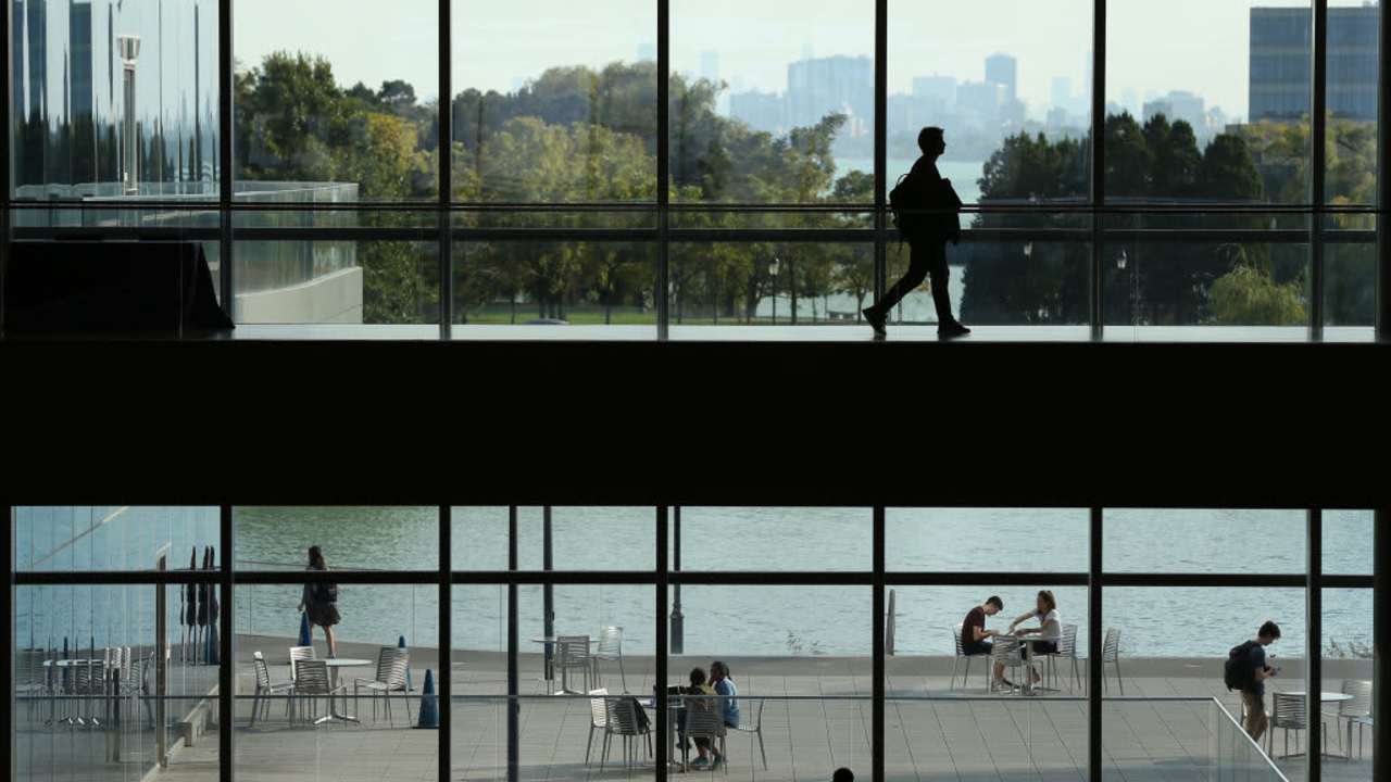 Students at Northwestern University's Kellogg School of Management walking to class at the school's campus in Evanston, Illinois.
