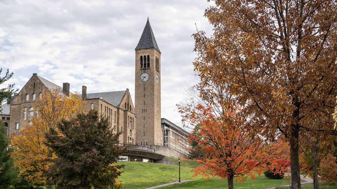 McGraw Clock Tower on the Cornell University campus on a sunny fall day. Cornell University is a top ranked ivy league and land-grant university located in the city of Ithaca in finger lakes region of New York.