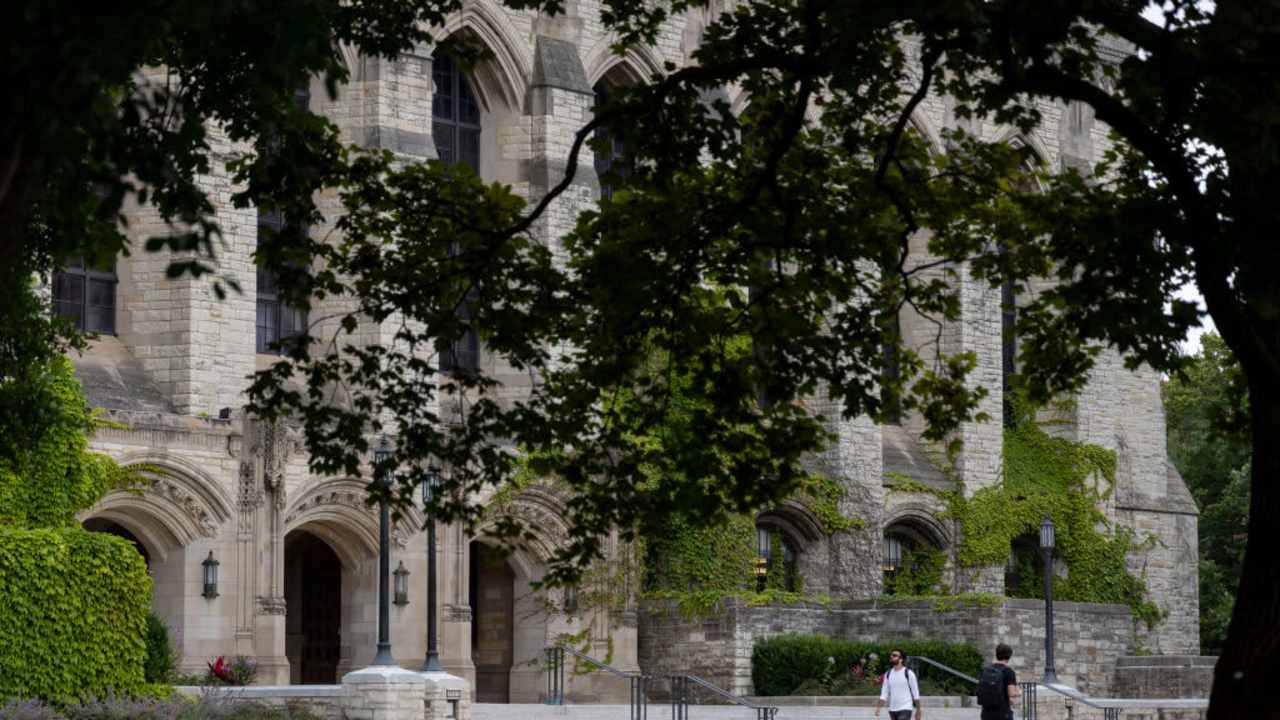 Students walking on the Northwestern University campus in Evanston, Illinois.