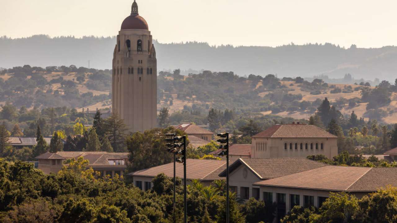 A view of the campus of Stanford University including Hoover tower as seen from Stanford Stadium