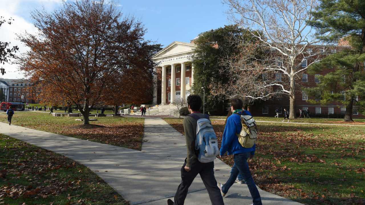 Students walking to class on the University of Maryland campus, which is a public state school, in College Park, Maryland.