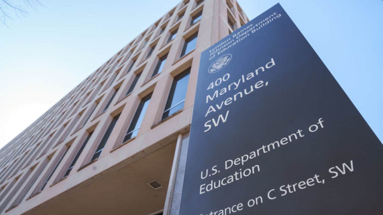 The US Department of Education sign marks the entrance to the federal building housing the agency's headquarters in Washington, DC.