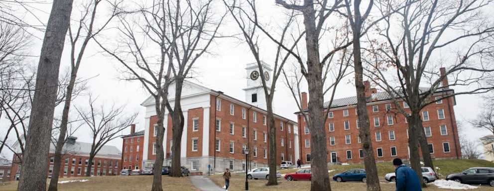 Students walk along the campus of Amherst College in Amherst, MA.