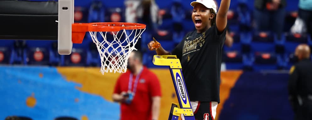 Agnes Emma-Nnopu of the Stanford Cardinal cuts down the net after the NCAA Women’s Basketball championship game on April 4, 2021.