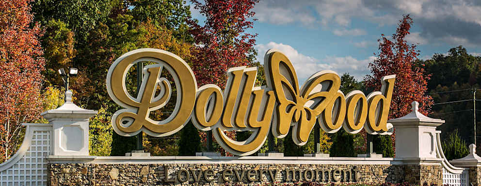 The golden entrance sign to Dollywood in Pigeon Forge, Tennessee.