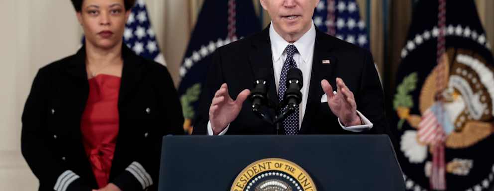 U.S. President Joe Biden speaks along side Director of the Office of Management and Budget Shalanda Young as he introduces his budget request for fiscal year 2023 in the State Dining Room of the White House