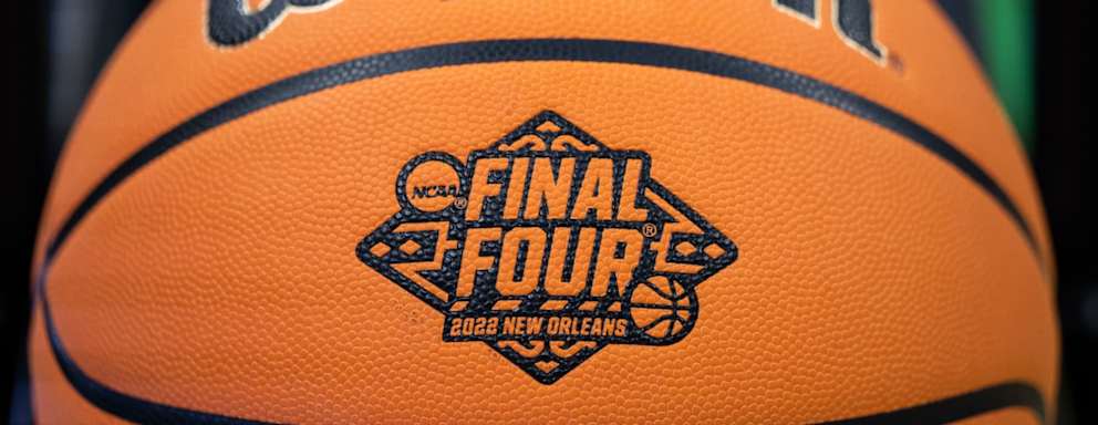 A close up picture of a basketball with the New Orleans Final Four logo