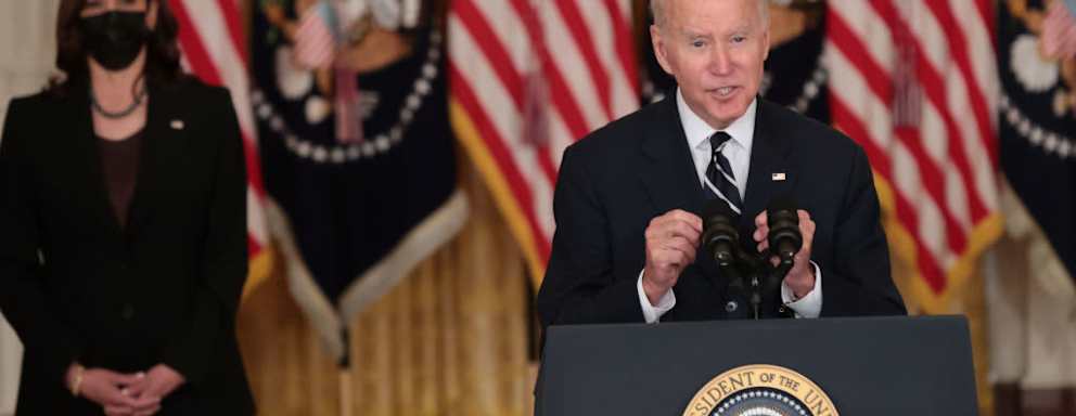U.S. President Joe Biden delivers remarks on his proposed "Build Back Better" social spending bill as Vice President Kamala Harris looks on in the East Room of the White House in Washington, DC.