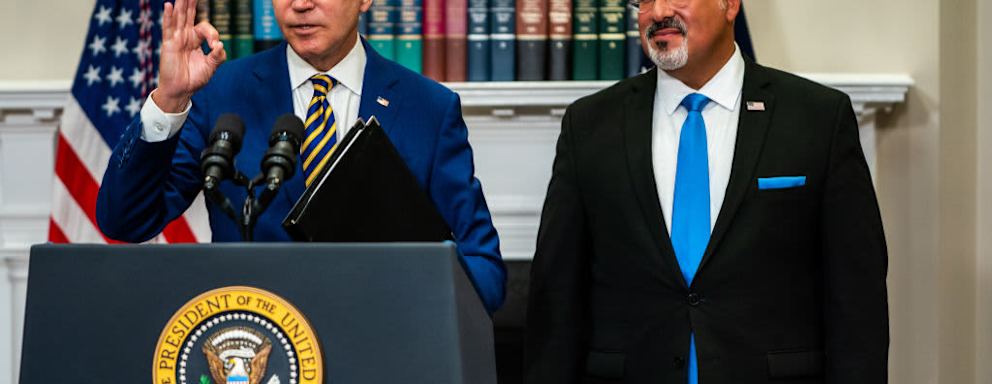 US President Joe Biden delivers remarks regarding student loan debt forgiveness in the Roosevelt Room of the White House on Wednesday August 24, 2022. Education Secretary Miguel Cardona joined.