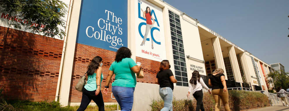Adult students walk to class on the Los Angeles Community College campus as a portion of the enrolled student body returns to in-class instruction.