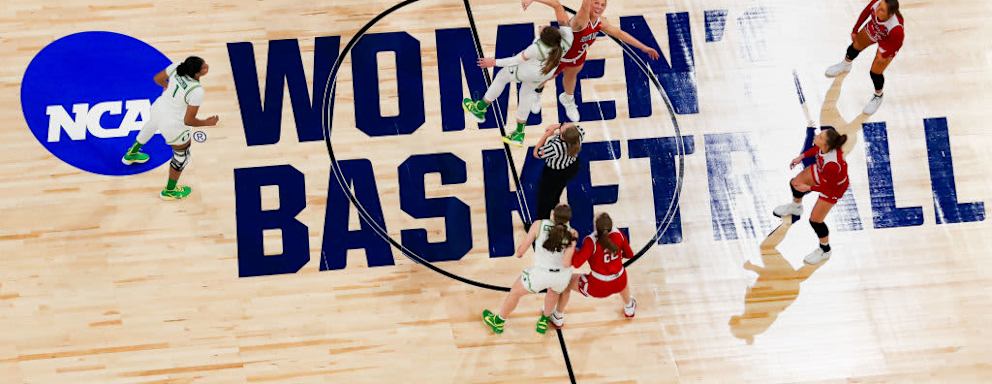 SAN ANTONIO, TEXAS - MARCH 22: Sedona Prince #32 of the Oregon Ducks and Macy Guebert #3 of the South Dakota Coyotes tip off in the first round game of the 2021 NCAA Women's Basketball Tournament at the Alamodome on March 22, 2021 in San Antonio, Texas.