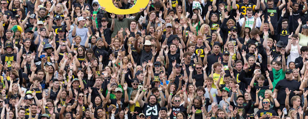 EUGENE, OR - SEPTEMBER 17: Fans of the Oregon Ducks cheer during the second half against the Brigham Young Cougars at Autzen Stadium on September 17, 2022 in Eugene, Oregon.