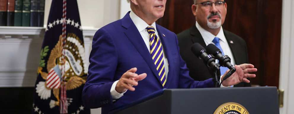 WASHINGTON, DC - AUGUST 24: U.S. President Joe Biden, joined by Education Secretary Miguel Cardona, speaks on student loan debt in the Roosevelt Room of the White House August 24, 2022 in Washington, DC. President Biden announced steps to forgive $10,000 in student loan debt for borrowers who make less than $125,000 per year and cap payments at 5 percent of monthly income.