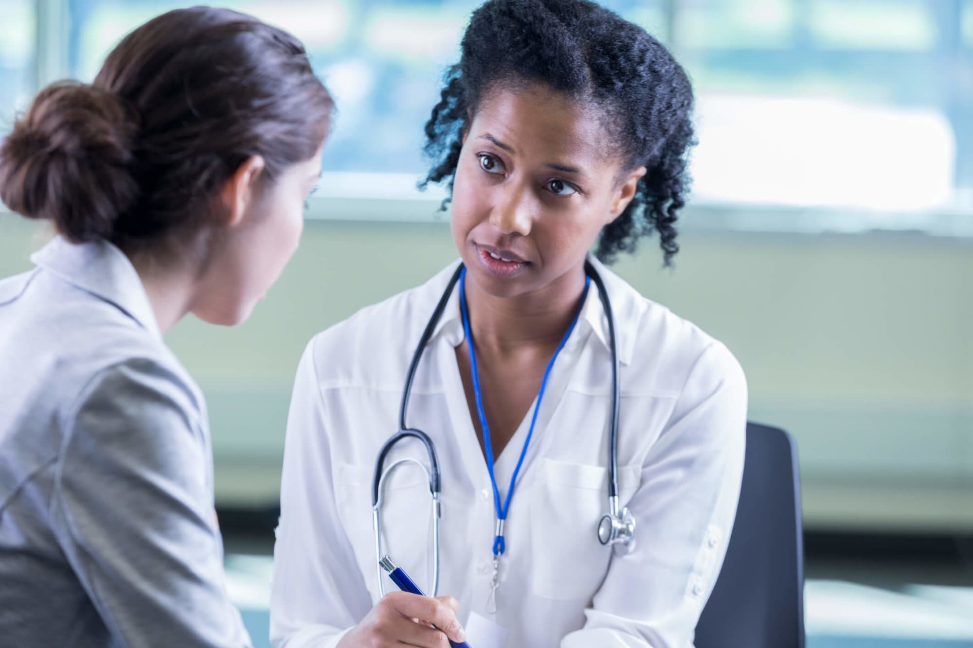 Psychiatric NP listens to patient with compasssion.