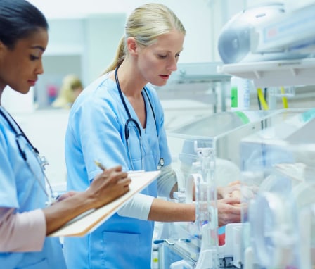 Nurses documenting findings