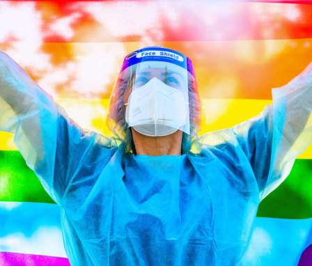 Healthcare worker with Pride flag