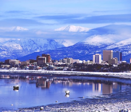 a scene of downtown Anchorage by the shore