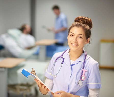 Nursing Assistant holding clipboard