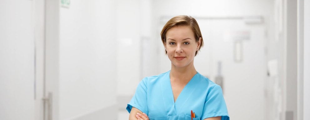 Confident female nurse in hospital