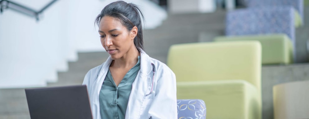 Nursing student studying in lecture hall