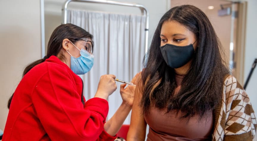 Colleges, States Spar Over COVID-19 Vaccine Mandates