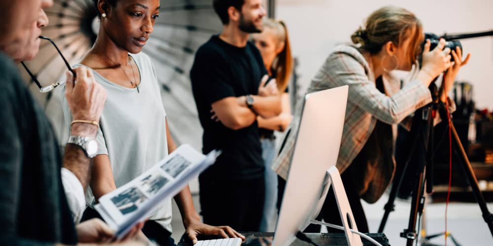 Image of group of people working at a photoshoot