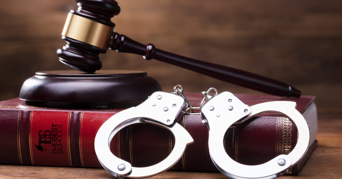 handcuffs in a courtroom on a book