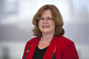 Portrait of Anne Dabrow Woods, DNP, RN, CRNP, ANP-BC, AGACNP-BC, FAAN