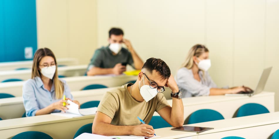 All college students must wear face masks due to COVID-19, but the policy raises challenges for students in terms of communication, confidence, and learning.