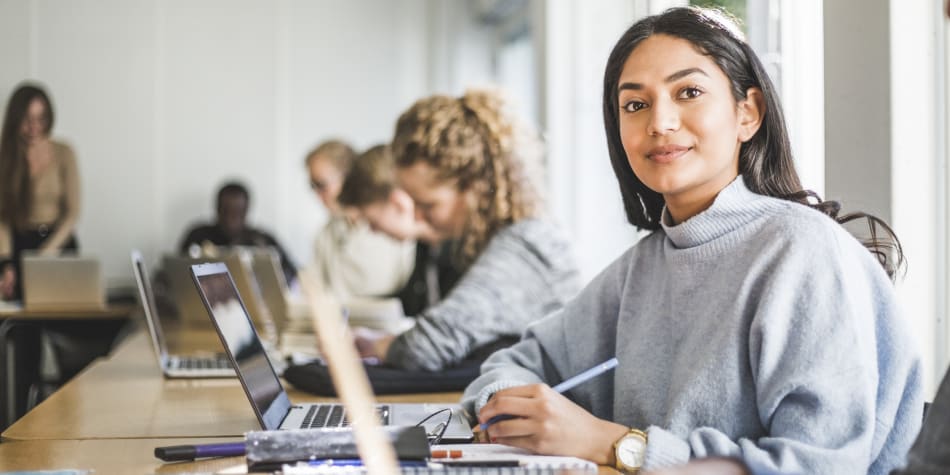 Universities can promote equity for women and combat gender discrimination in the workforce by holding workshops and highlighting women's accomplishments.