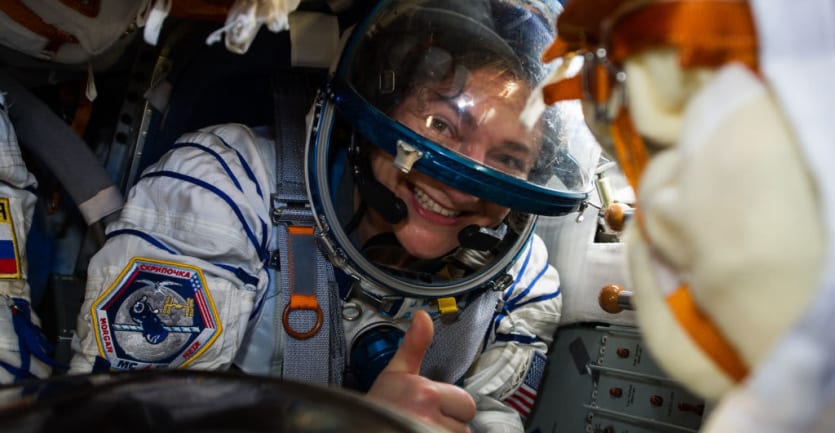 U.S. astronaut Jessica Meir of NASA gives a thumbs-up after landing aboard the Soyuz MS-15 capsule with two other ISS Expedition 62 crew members in Kazakhstan.