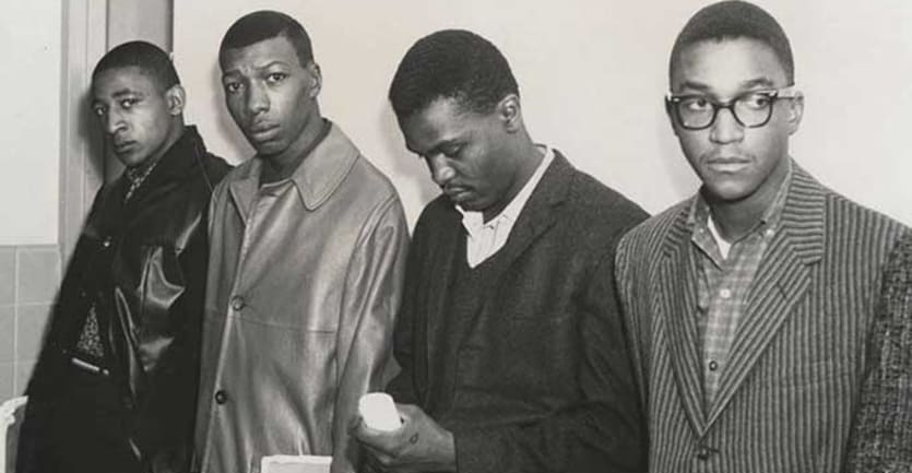 A photograph of four Alabama State University students who were expelled for staging a sit-in at Montgomery County Courthouse in 1960.