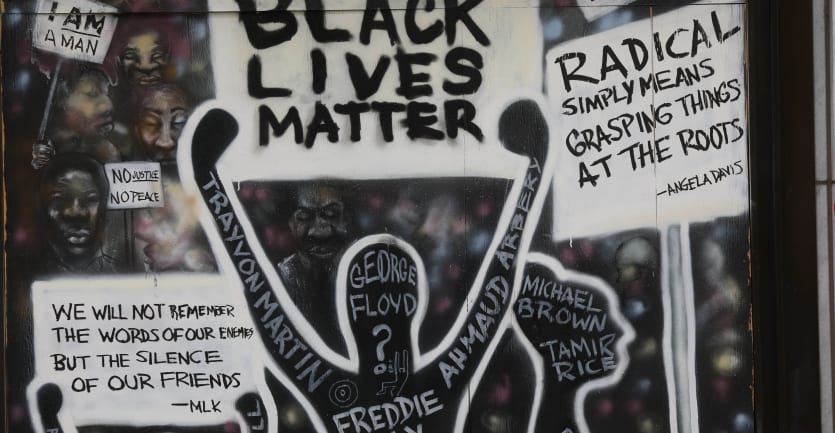 A painted Black Lives Matter collage that includes several abstract figures holding up protest signs.