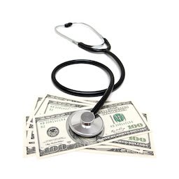 Stethoscope on US Paper Currency isolated on white