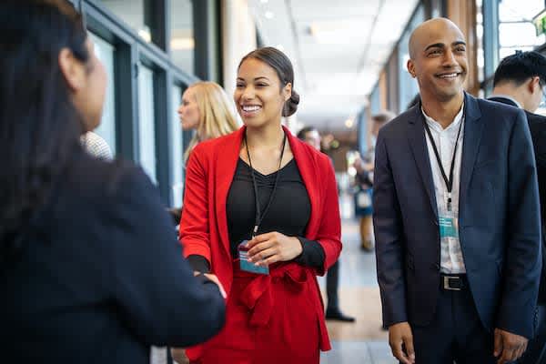 MBA graduate networking professionally