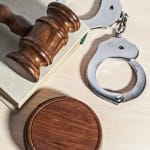 image of handcuffs and gavel illustrating criminal justice