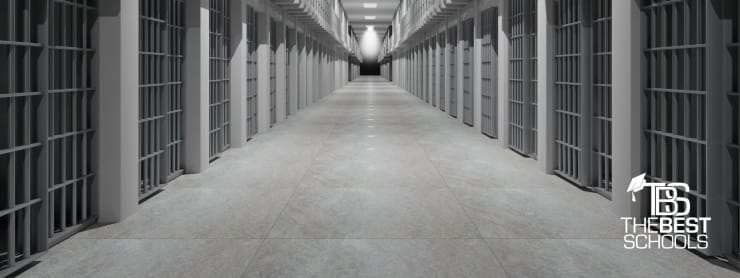 Perspective photo of empty prison cell block