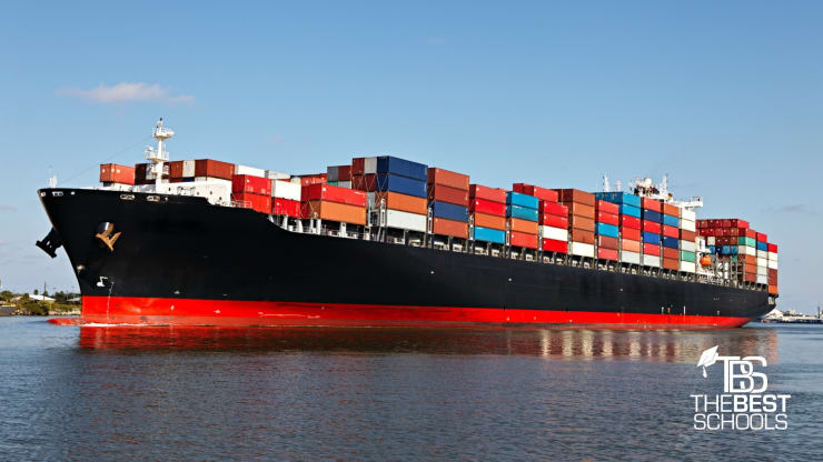 The 10 Best Online Bachelor's in International Business Programs Hero Image: The 10 Best Online Bachelor's in International Business Programs (Image of shipping container vessel at sea)