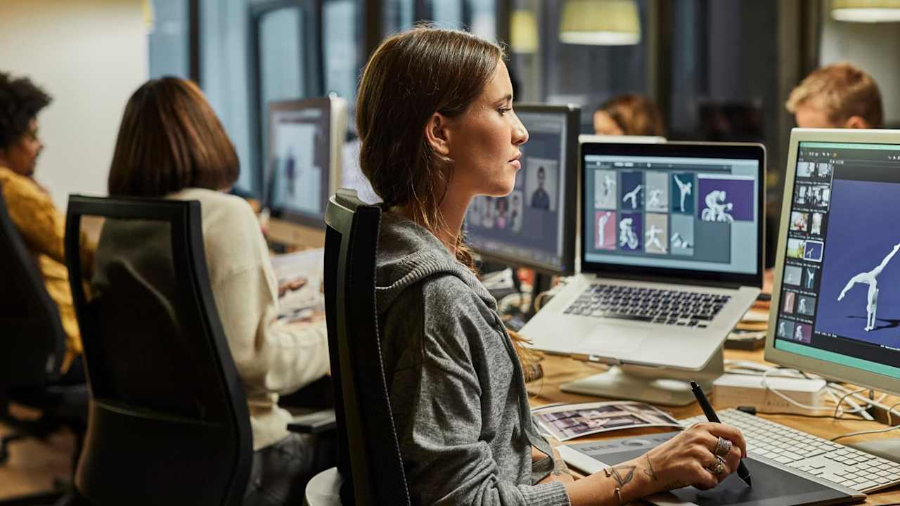 Person drawing digital art on tablet
